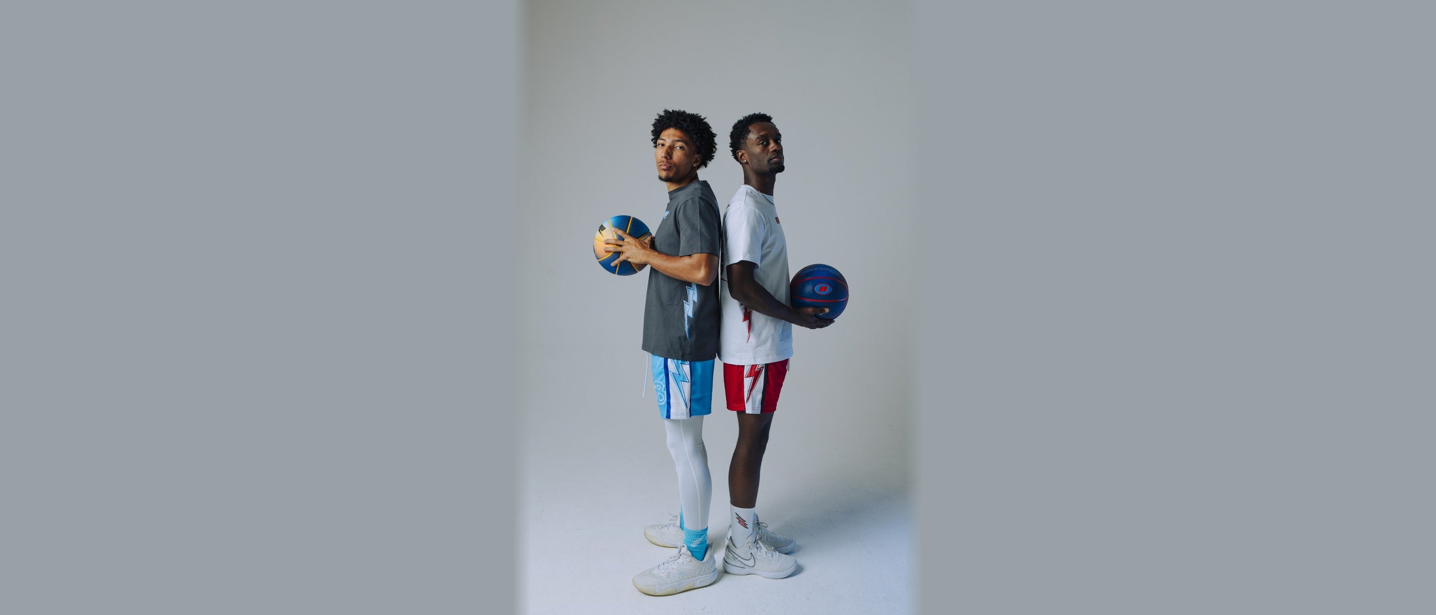 Clutch Adult — two models with basketballs