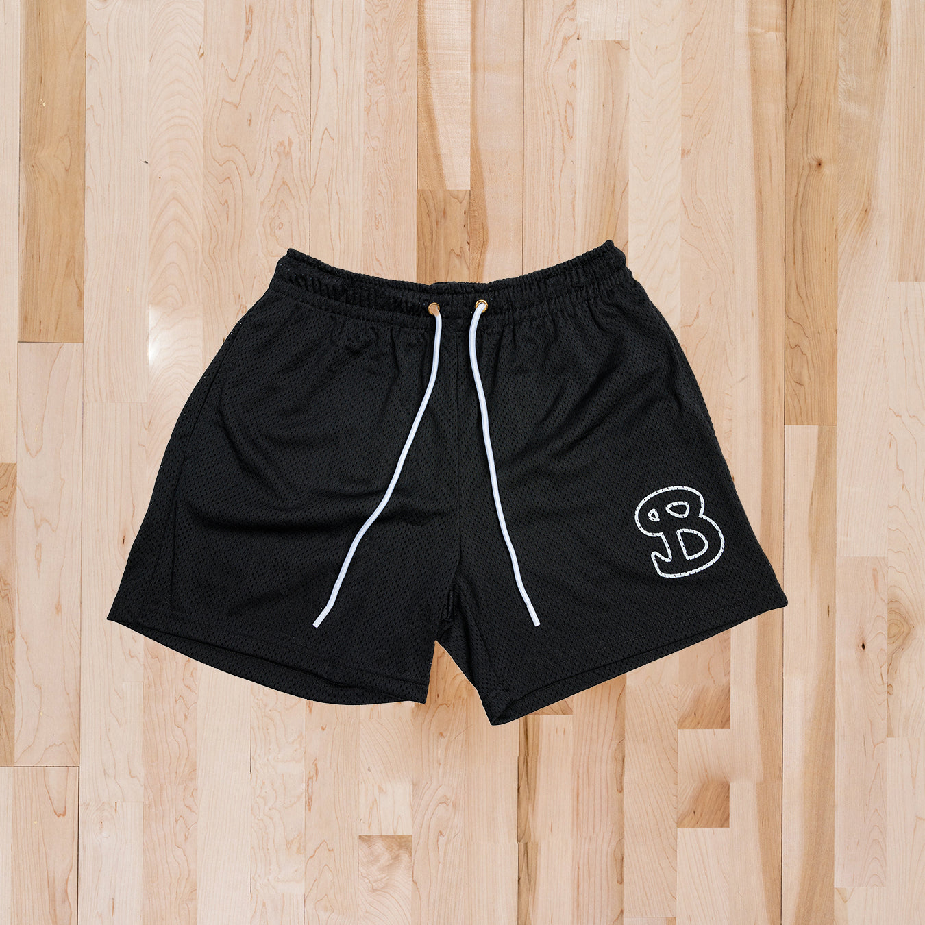 ESSENTIALS: Black Solid Shorts - ADULT