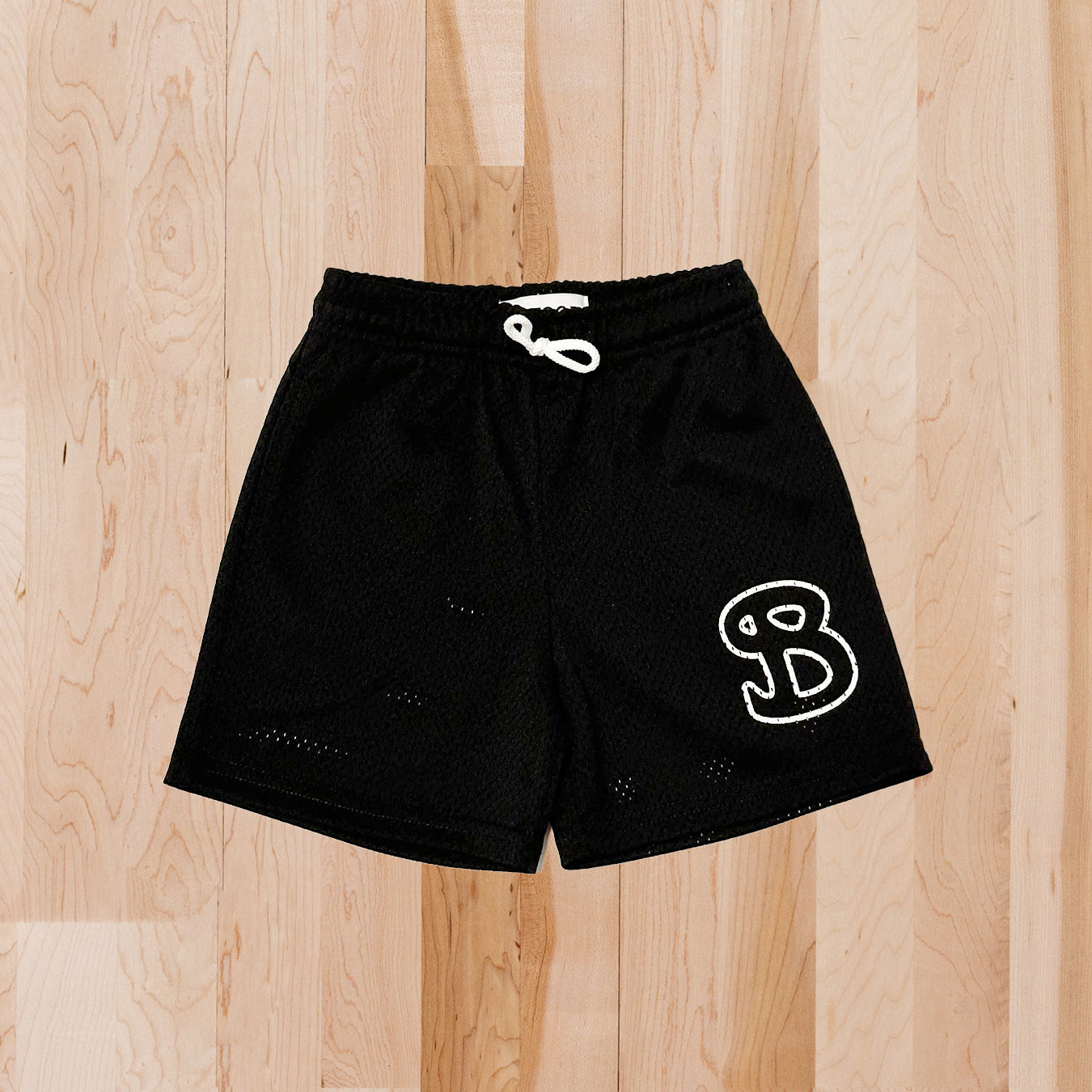 ESSENTIALS: Black Solid Shorts - YOUTH